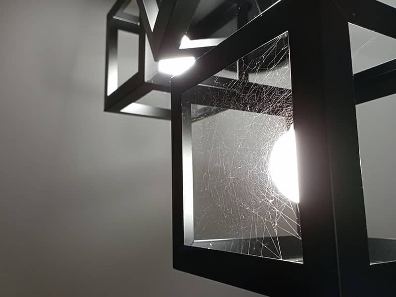 spider web around a light outside yarmouth maine home