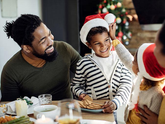 happy family inside a pest free maine home for the holiday season