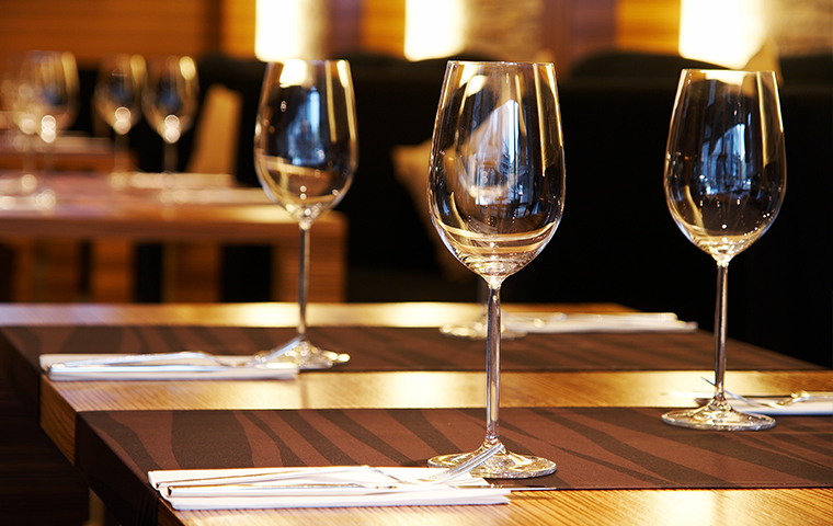 Keep Pests Out Of Your Restaurant close up of wine glasses on a clean restaurant table