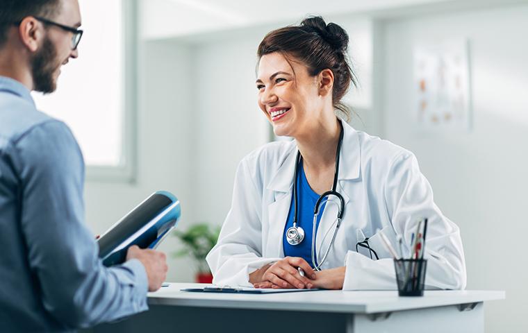 doctor and patient at desk