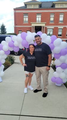 Two People Posing for a Picture