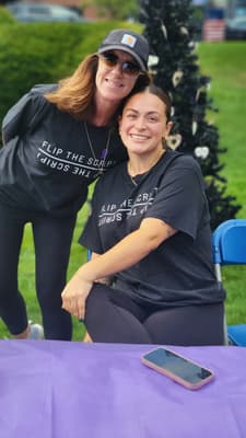 Two people posing for a picture