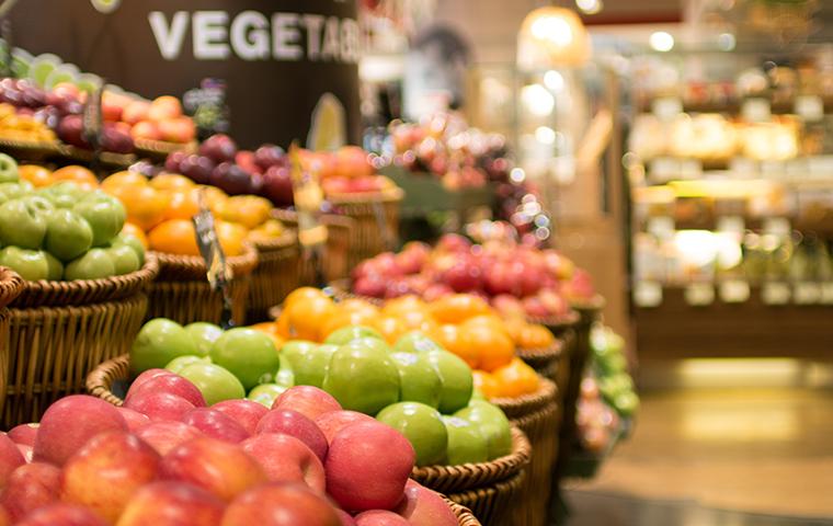 a fruit and vegetable section of a grocery store