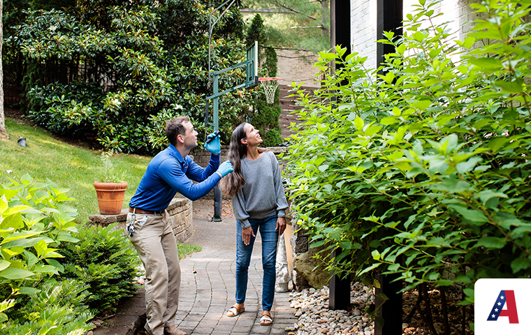 Learn Why Outdoor Pest Control Helps Control Pests Indoors pest expert inspecting outdoor space