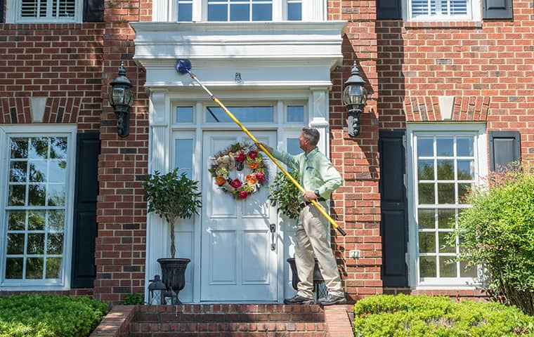 Protect Your Home From Spiders In Murfreesboro TN all american tech providing exterior home pest control services in murfreesboro tennessee