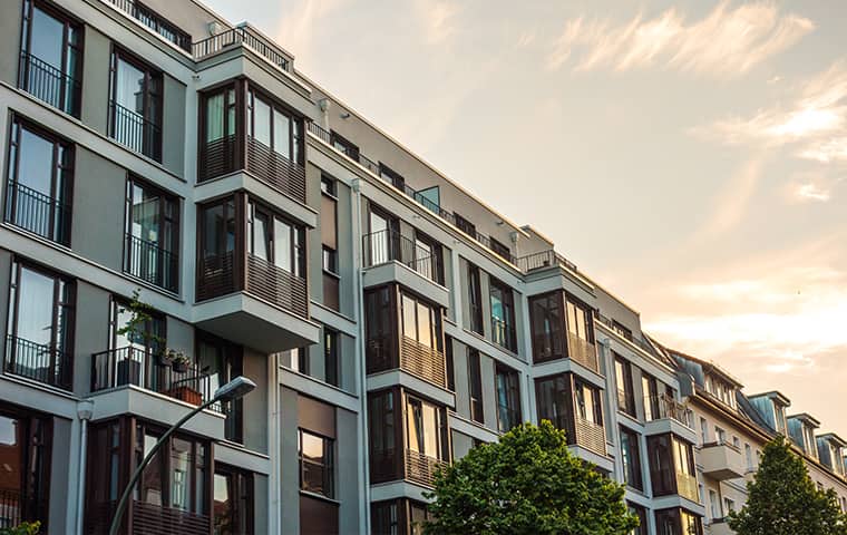 We Develop Custom Treatment Options For NC Businesses a row of commercial apartments serviced by four seasons hometown pest control in shiloh north carolina