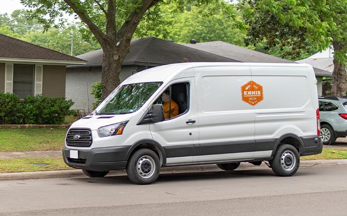 Our Follow Up Services Make Sure Pests Are Gone company van pulling up to house in fayetteville georgia
