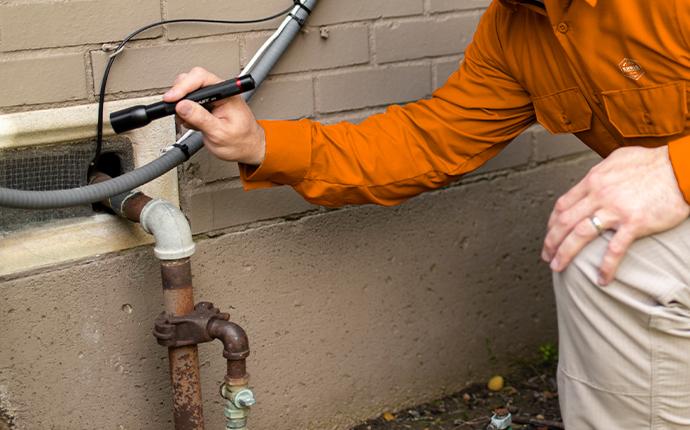 Our Technicians Are Friendly And Local technician inspecting home in fayetteville georgia